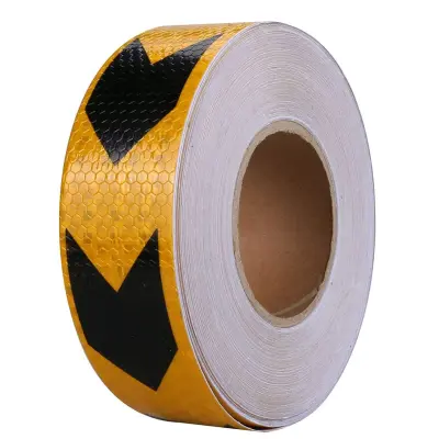 Banda reflectorizanta adeziva tip fagure - sageata negru-galben (rola 5cm x 25m)